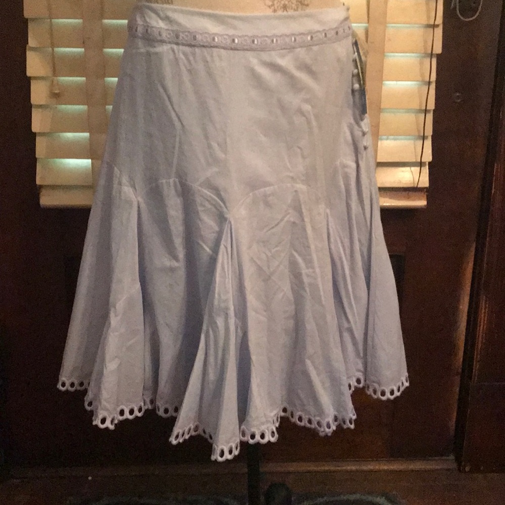 Retro lined skirt with button and ribbon trim